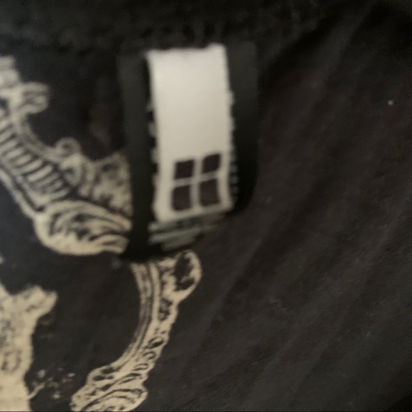 Fun, sexy layer. Featuring silver circle details. - Picture 2 of 6